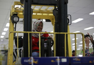 Lita Safriana, 22, a female forklift driver at RAPP's manufacturing complex in Pelalawan, Riau. (Photo courtesy of RAPP/Reza Amirul Juniarshah)
