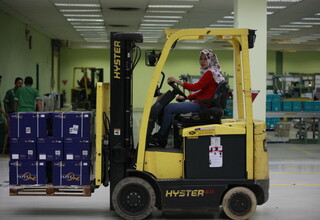 Lita has been driving a forklift for more than a year but, ironically, she still does not know how to drive a car. (Photo courtesy of RAPP/Reza Amirul Juniarshah)