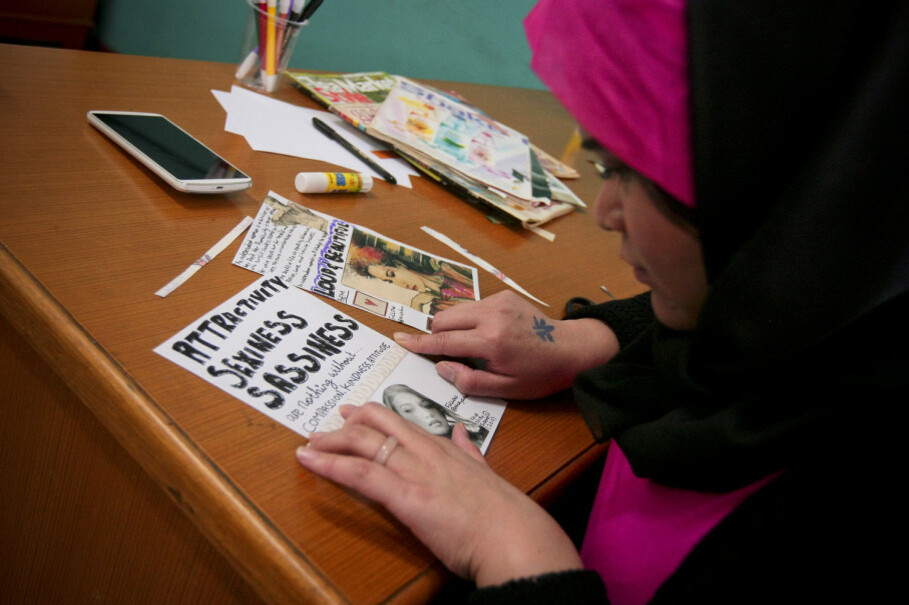 A woman making a zine during a workshop at Feminist Fest on Saturday. A zine, short for 'fanzine' or 'magazine,' is an alternative form of print media that is usually published in a small group and reproduced by way of photocopying. (JG Photo/Yudha Baskoro)