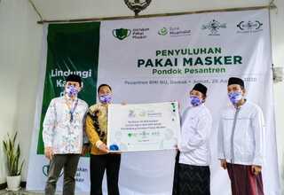 Bank Muamalat dan BMM Sosialisasi Penggunaan Masker di Ponpes NU