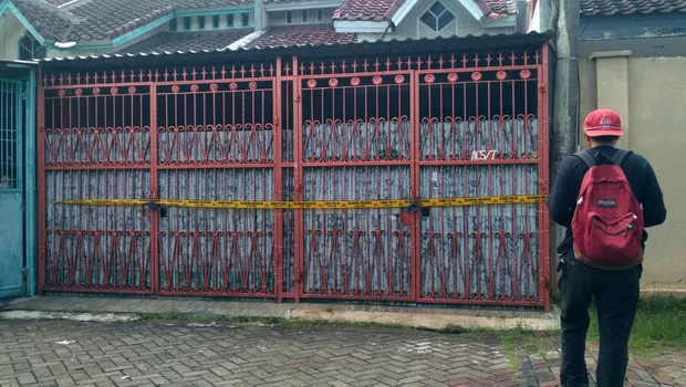 Rumah di kawasan Perum Citra I Extension Blok AC5 RT 7 RW 7 Kalideres, Jakarta Barat di mana satu keluarga ditemukan tewas.