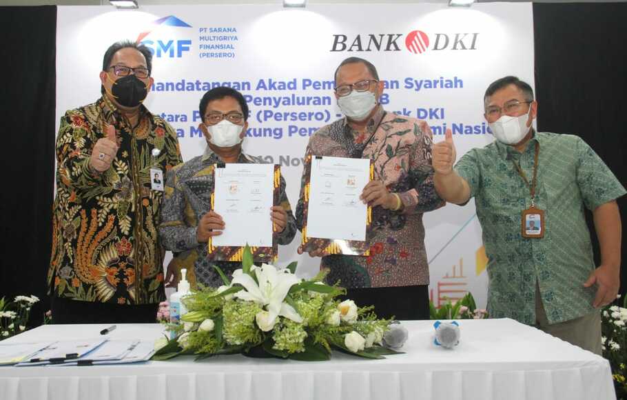 Penandatanganan Akad Mudharabah Muqayyadah antara Unit Usaha Syariah (UUS) Bank DKI dengan SMF di Jakarta, Rabu, 10 November 2021.

