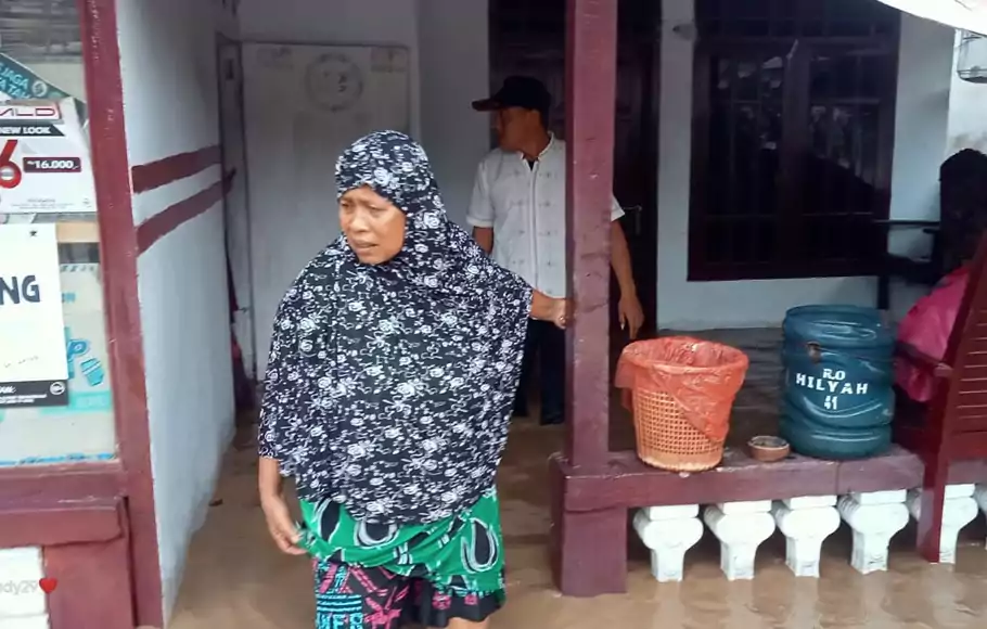 
Kondisi banjir yang melanda rumah warga di Desa Mohungo, Kecamatan Tilamuta, Boalemo, Jumat, 18 Februari 2022