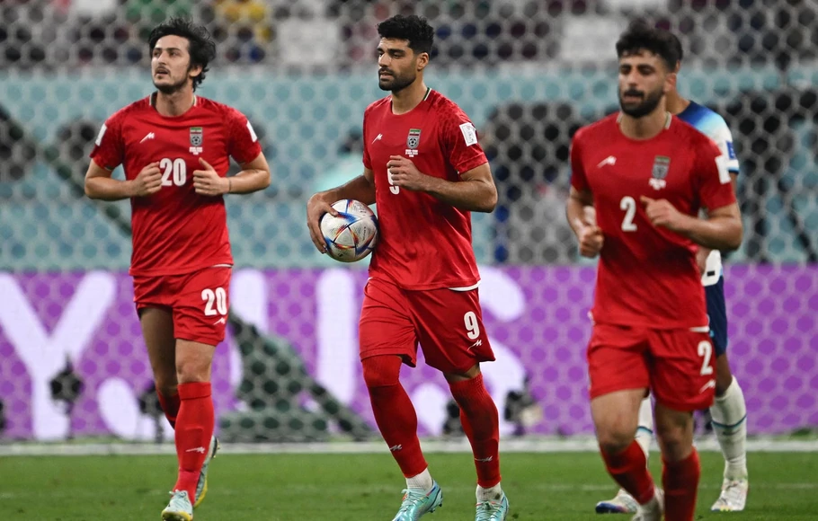Pemain Iran, Mehdi Taremi, setelah menjebol gawang Inggris pada Piala Dunia 2022 di Qatar.