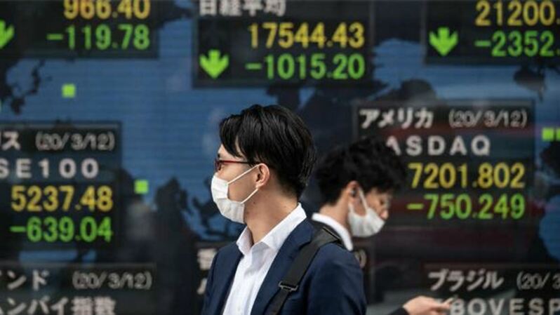 Ilustrasi bursa saham asia. Foto: AFP