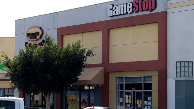 Logo GameStop terlihat di atas toko di Culver City, California, Amerika Serikat (AS), pada 28 Januari 2021. ( Foto: Chris Delmas / AFP )