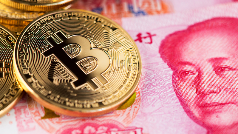 Ilustrasi bitcoin dan mata uang yuan Tiongkok. ( Foto: coindesk.com / Shutterstock )