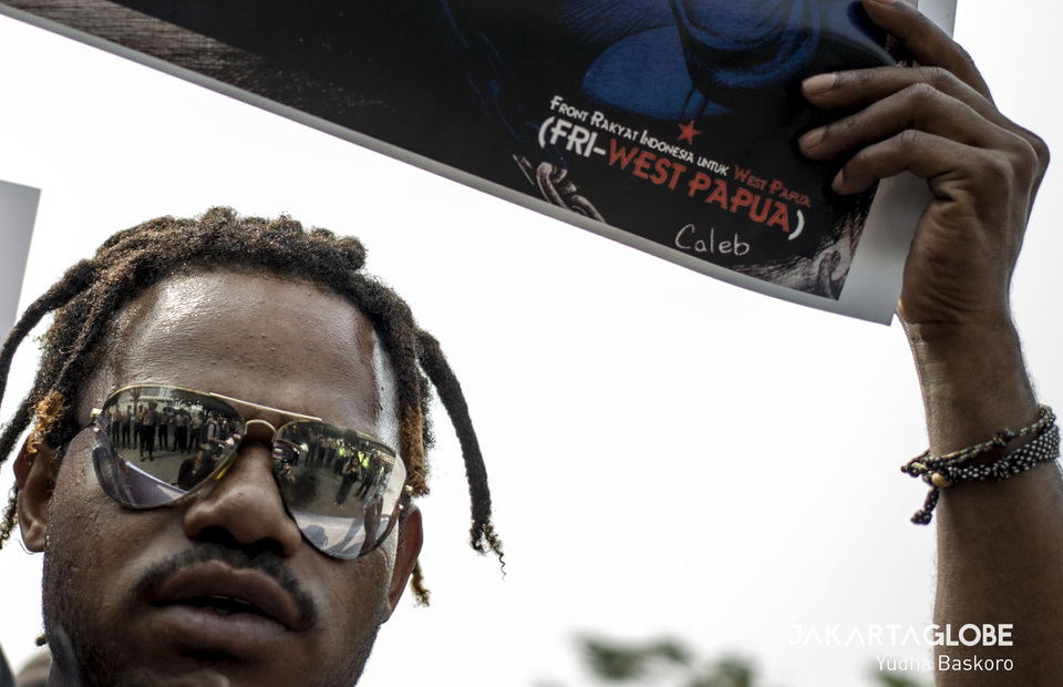 A member of the Indonesian People's Front for West Papua (FRI-WP) participates in the march in Jakarta on Thursday. (JG Photo/Yudha Baskoro) 