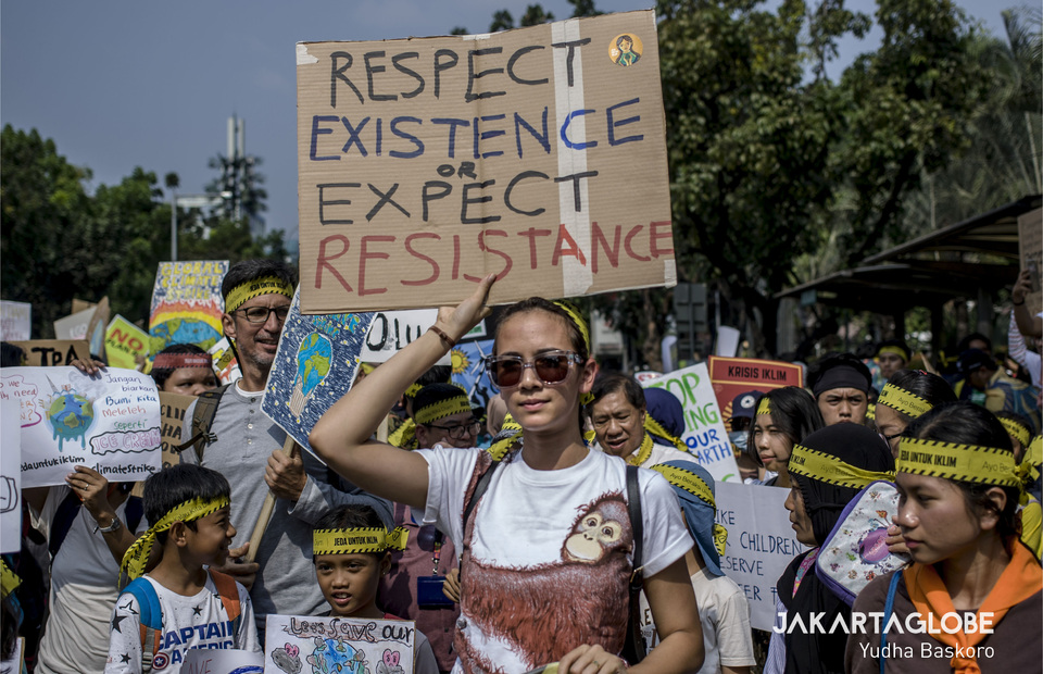 'Respect excistence or expect resistance' the placard said. (JG Photo/Yudha Baskoro)