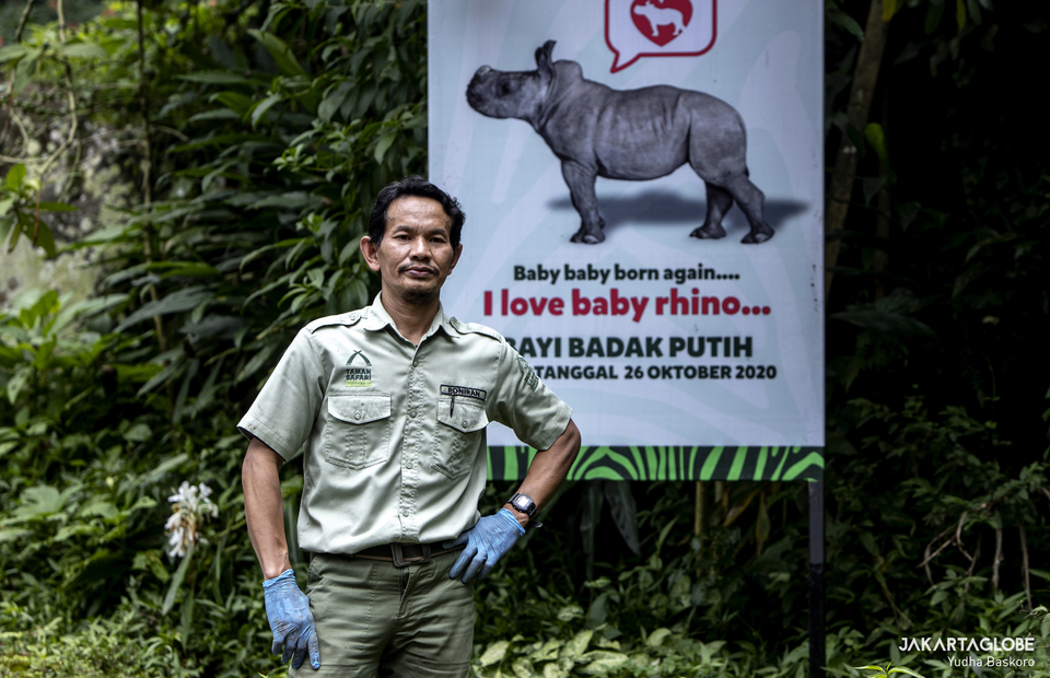 Poniran poses in front of banner at Taman Safari Indonesia, in Bogor, West Java on Jan, 25, 2021. (JG Photo/Yudha Baskoro)