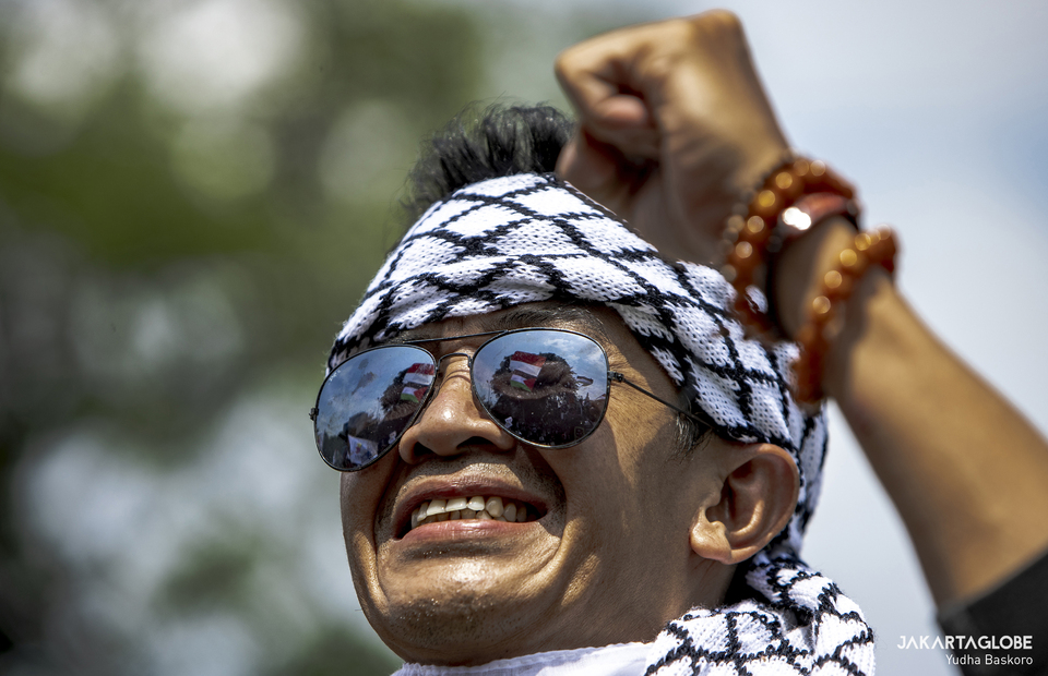A protester yells during protest against Israel in front of US Embassy building in Central Jakarta on May 18, 2021. (JG Photo/Yudha Baskoro)