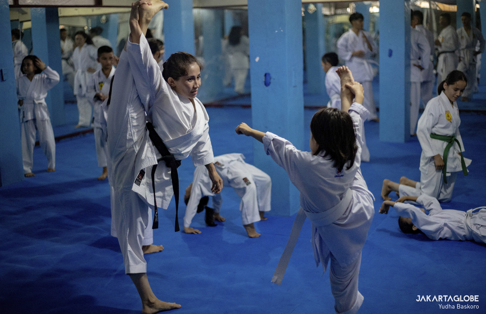 Sensi Meena trains a young girl at Cisarua Refugee Shotokan Karate Clubs dojo in Cisarua, Bogor, West Java on September 8, 2021. (JG Photo/Yudha Baskoro)