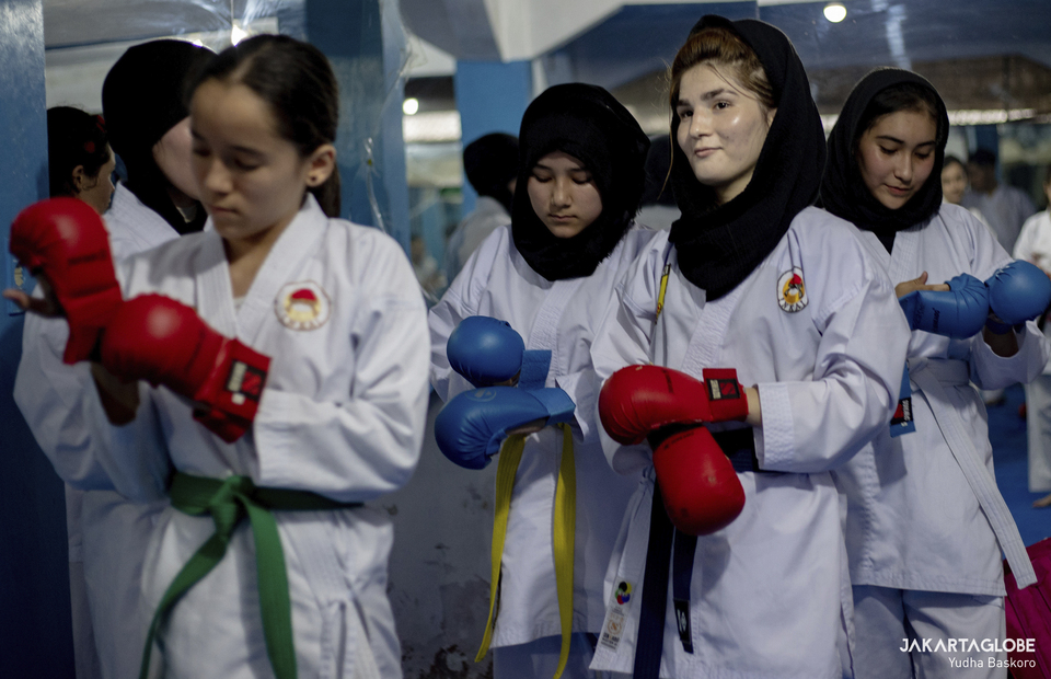 Young Afghan refugee women prepare to do kumite or sparring at Cisarua Refugee Shotokan Karate Clubs dojo in Cisarua, Bogor, West Java on September 8, 2021. (JG Photo/Yudha Baskoro)