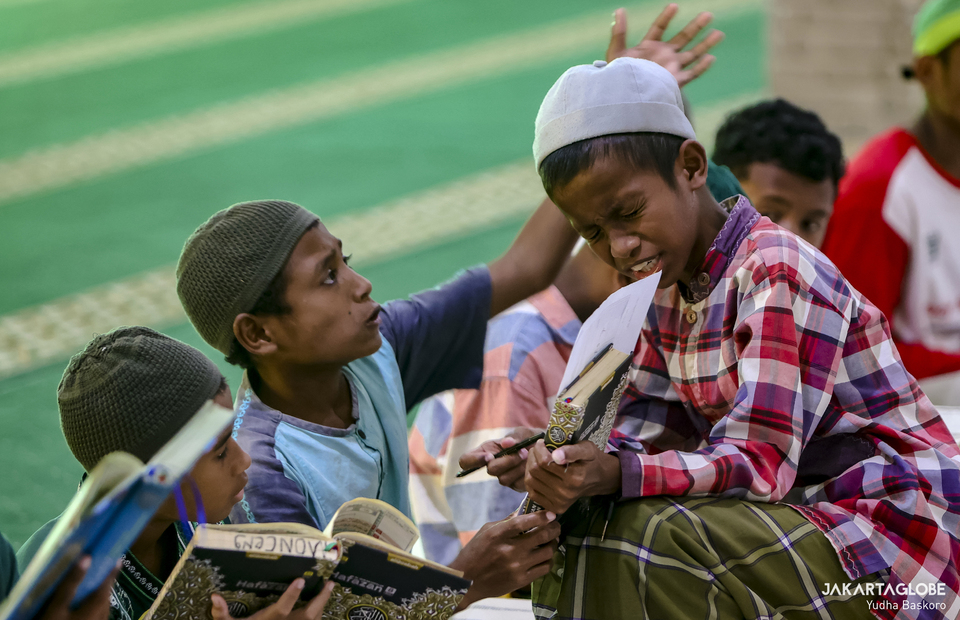 A santri play with his friend at Nuu Waar Islamic Boarding School in Bekasi on April 13, 2022. (JG Photo/Yudha Baskoro)