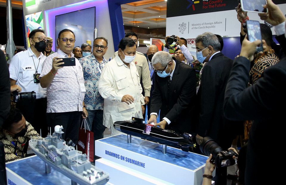 Defense Minister Prabowo Subianto is briefed about the BrahMos supersonic cruise missile system during the Indo Defence arms exhibition in Kemayoran, Central Jakarta, on November 4, 2022. (Joanito De Saojoao)